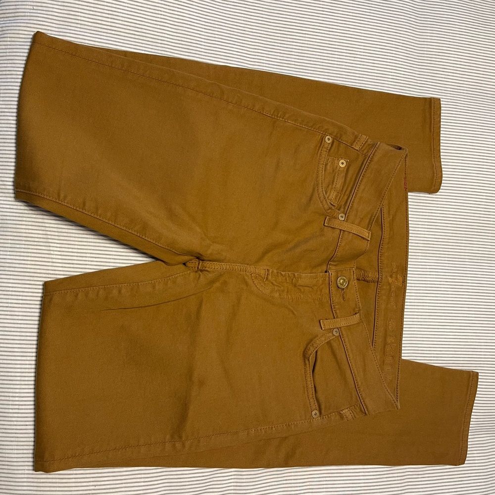 7 for All Mankind colored skinny Jean. Deep mustard yellow color